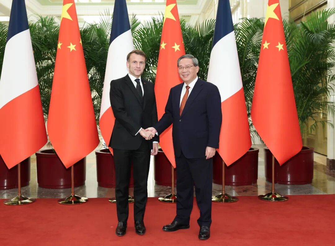 李强会见法国总统马克龙